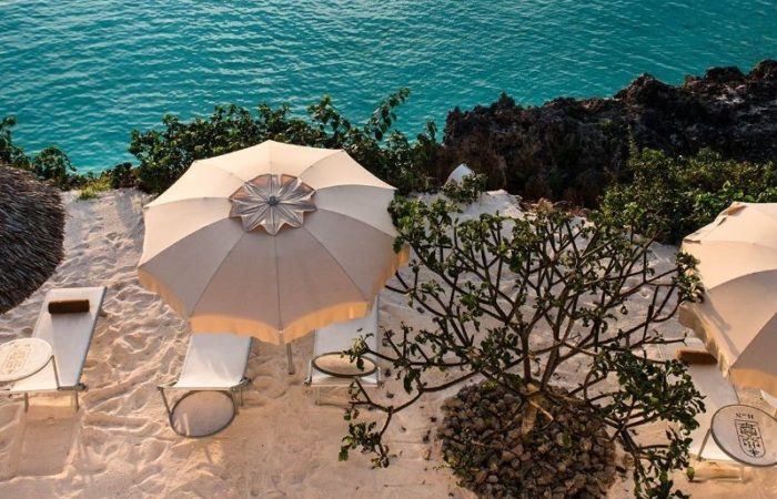 Riu Palace Zanzibar - North West, Zanzibar - tanning on a cliff at tee beach